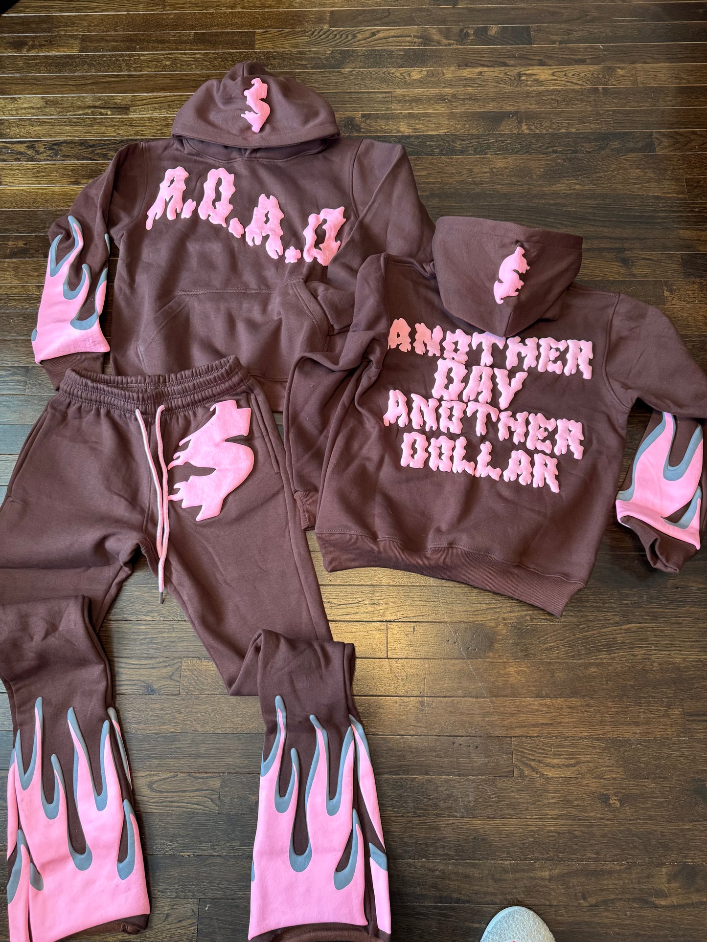 “Another day Another dollar” stacked sweatsuits