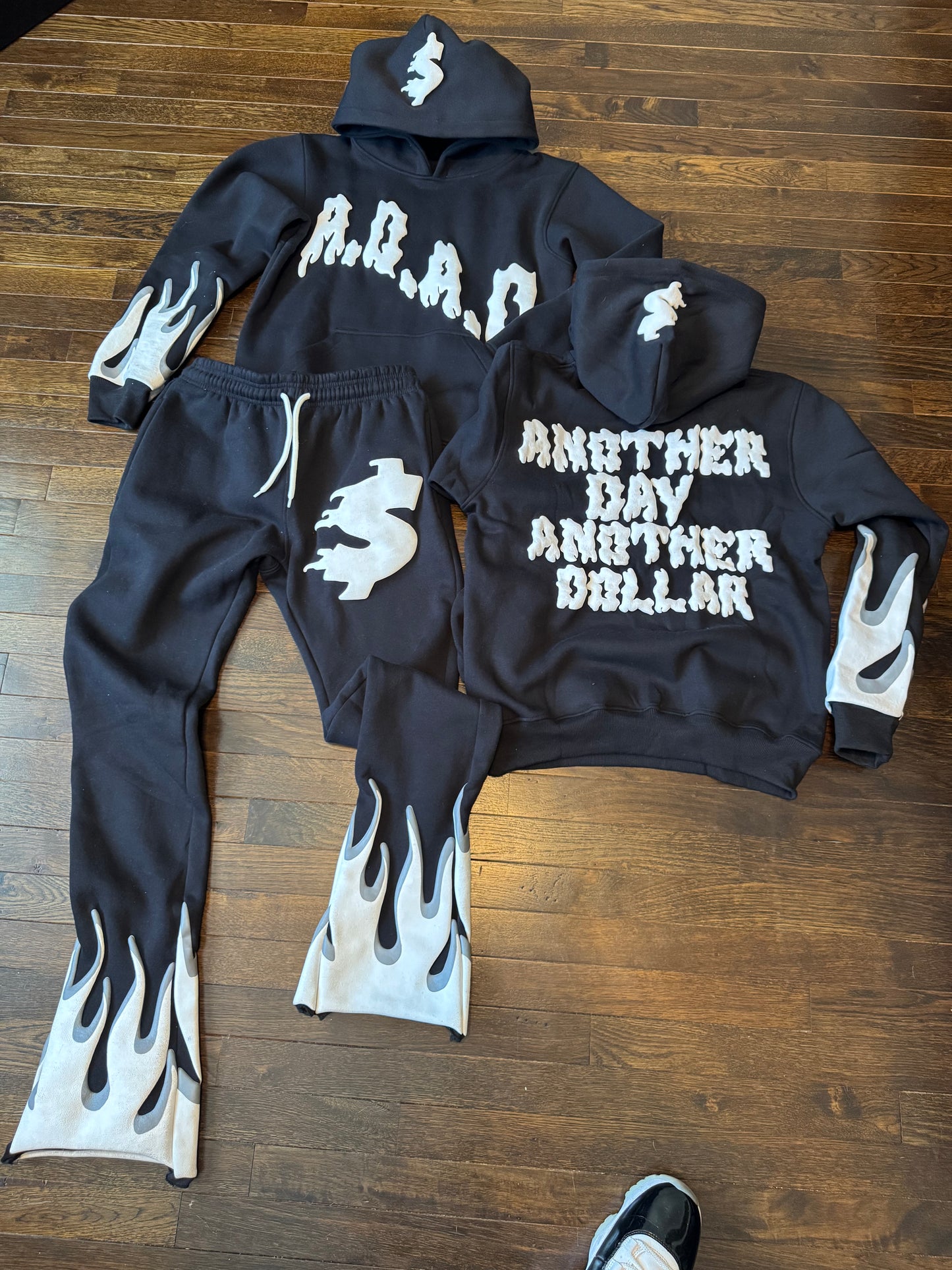 “Another day Another dollar” stacked sweatsuits